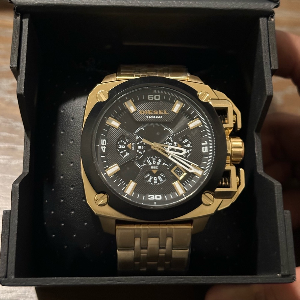 Gold diesel watch